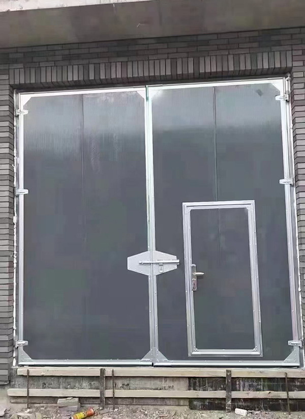 古浪工业平开门在大型设备制造车间的应用实例